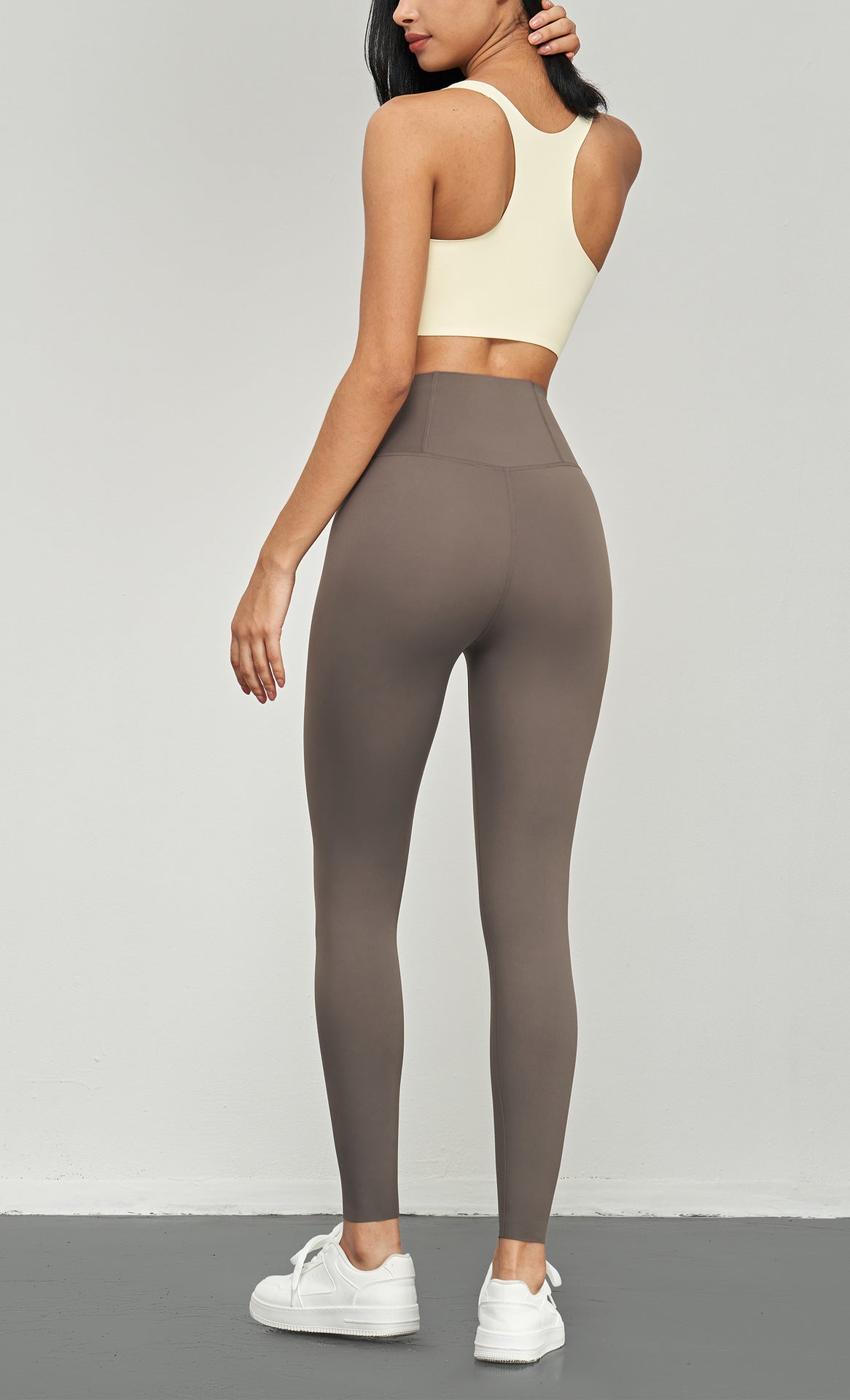 2023.08 Lycra new nude back waist pocket sports tights seamless anti-rolling fitness pants high waist peach hip yoga pants