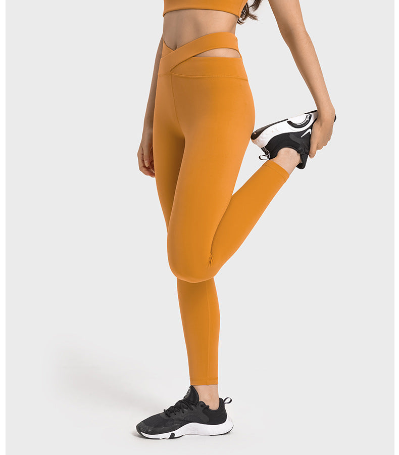 2023.09 Creora Hyosung nude high waist hip lift yoga pants hollowed out cross waist head nine-point sports tights women wear