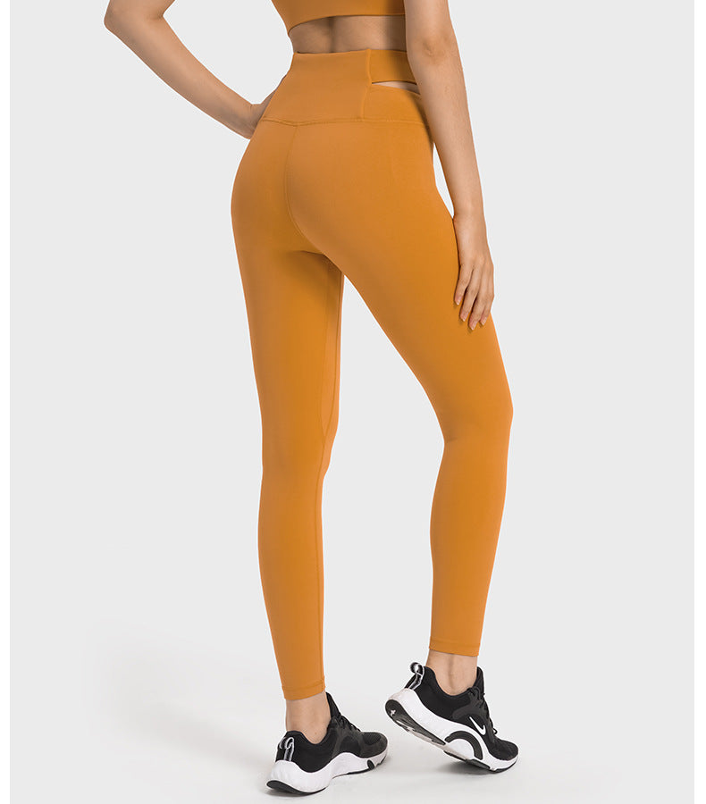 2023.09 Creora Hyosung nude high waist hip lift yoga pants hollowed out cross waist head nine-point sports tights women wear