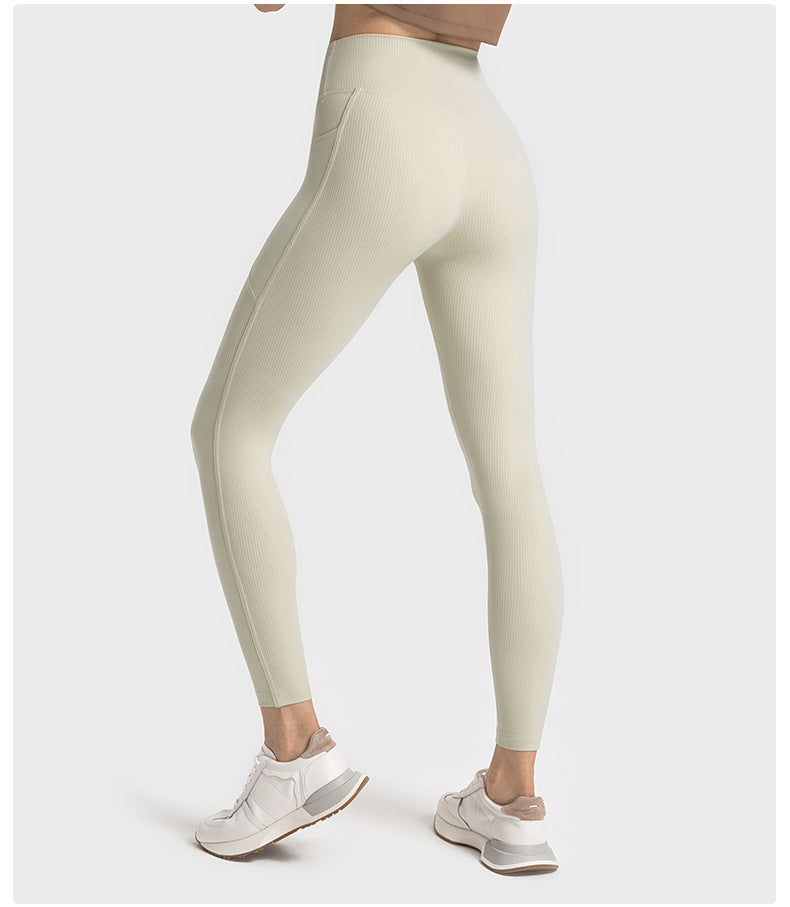 SPR pumped ribbed no T-line side pockets high waist hip-lifting yoga pants strong plastic belly-holding running sports nine-point pants women