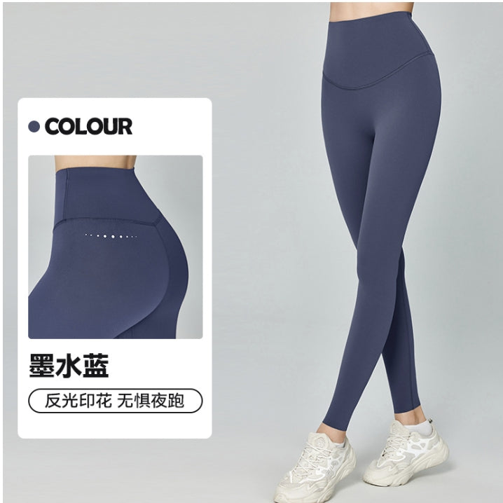 08/2024 High waist hip-lifting sports leggings for women with reflective prints peach hip yoga pants for outdoor running and fitness trousers