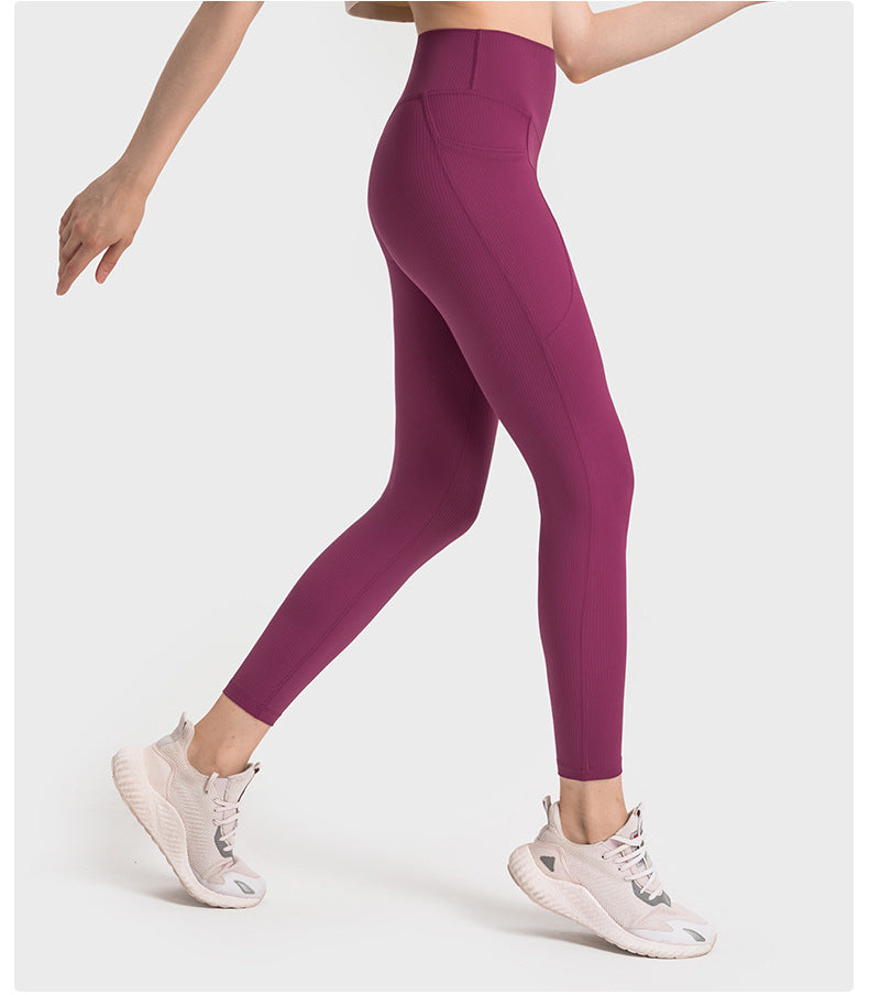 SPR pumped ribbed no T-line side pockets high waist hip-lifting yoga pants strong plastic belly-holding running sports nine-point pants women