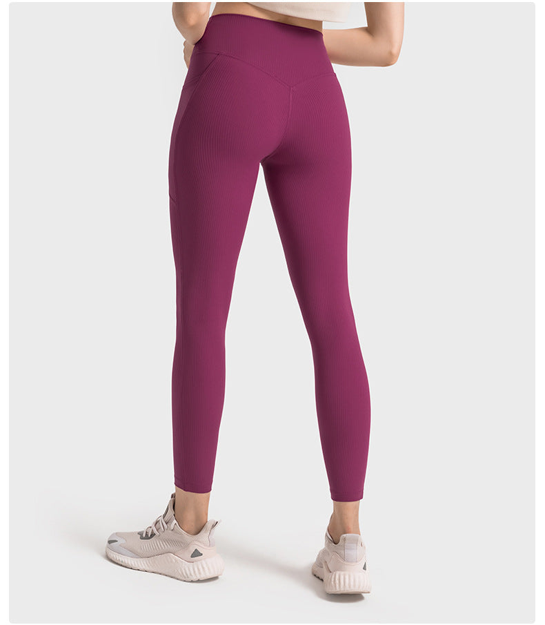 SPR pumped ribbed no T-line side pockets high waist hip-lifting yoga pants strong plastic belly-holding running sports nine-point pants women